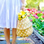 Woman With Flower Basket | DIY Spring Garden Ideas To Get Ahead This Growing Season | Featured
