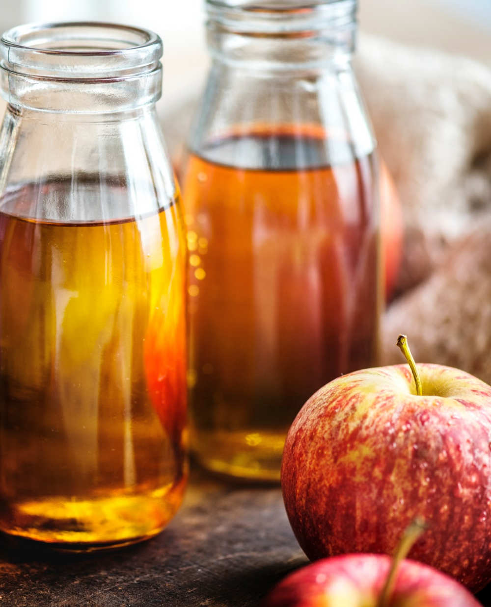 Apple cider vinegar | The Best Homemade Dog Repellent For Your Garden | chili powder
