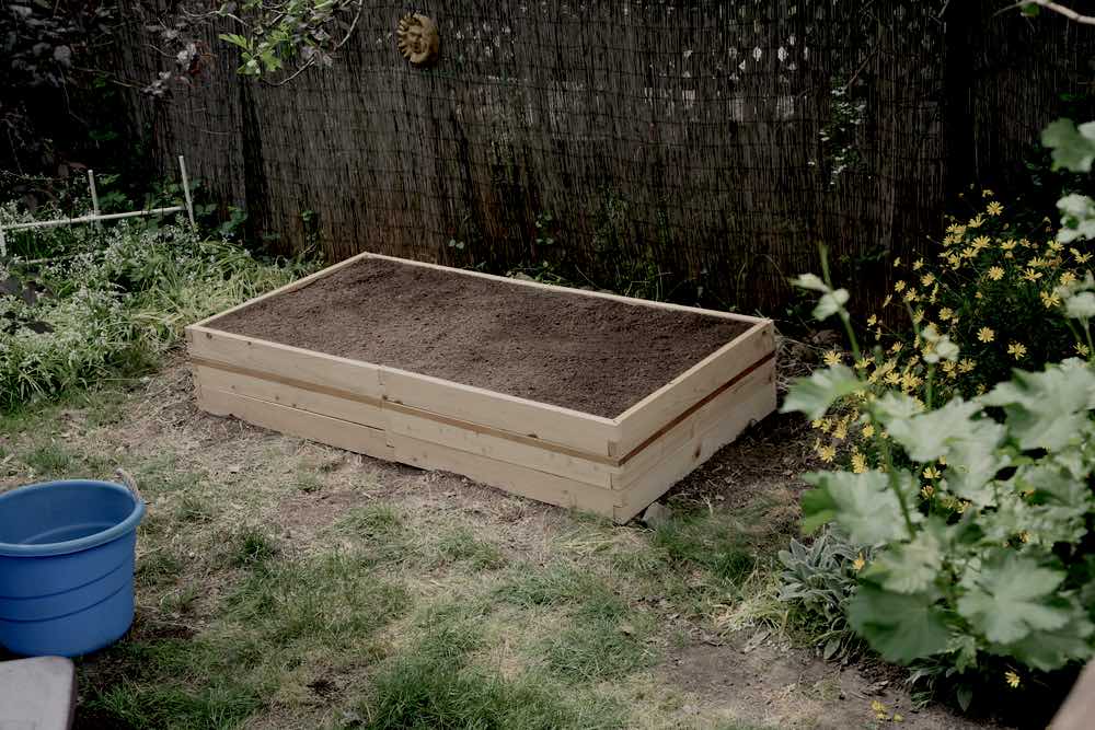 Raised Bed With Soil Backyard Garden | Raised Bed Gardening Ideas: DIY A Raised Garden Bed