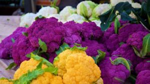 orange and purple and white cauliflower at the farmer's market | How To Grow Cauliflower In Your Backyard | how to grow cauliflower | featured