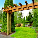 Entrance in the garden with wooden arbor | How To Build Your Own Wood Arbor For Your Fall Garden | wood arbor with gate