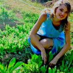 Woman Planting Crops | 10 Easy Vegetable Gardening Tips To Achieve An Abundant Harvest | Featured